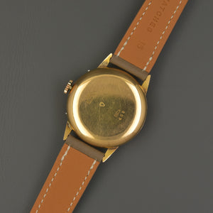 Movado Triple Date 18k