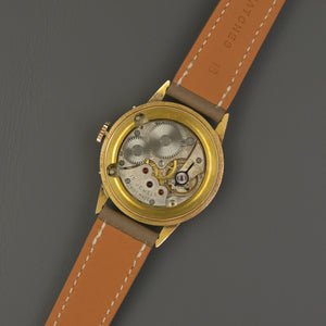 Movado Triple Date 18k