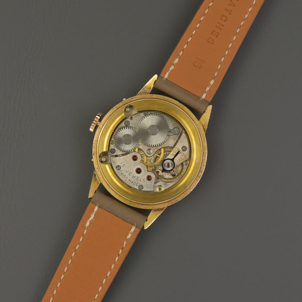 Movado Triple Date 18k